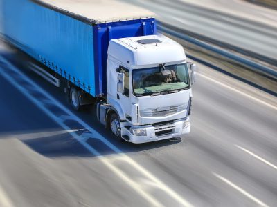 Truck showcasing how to transport a shipping container