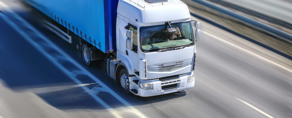 Truck showcasing how to transport a shipping container